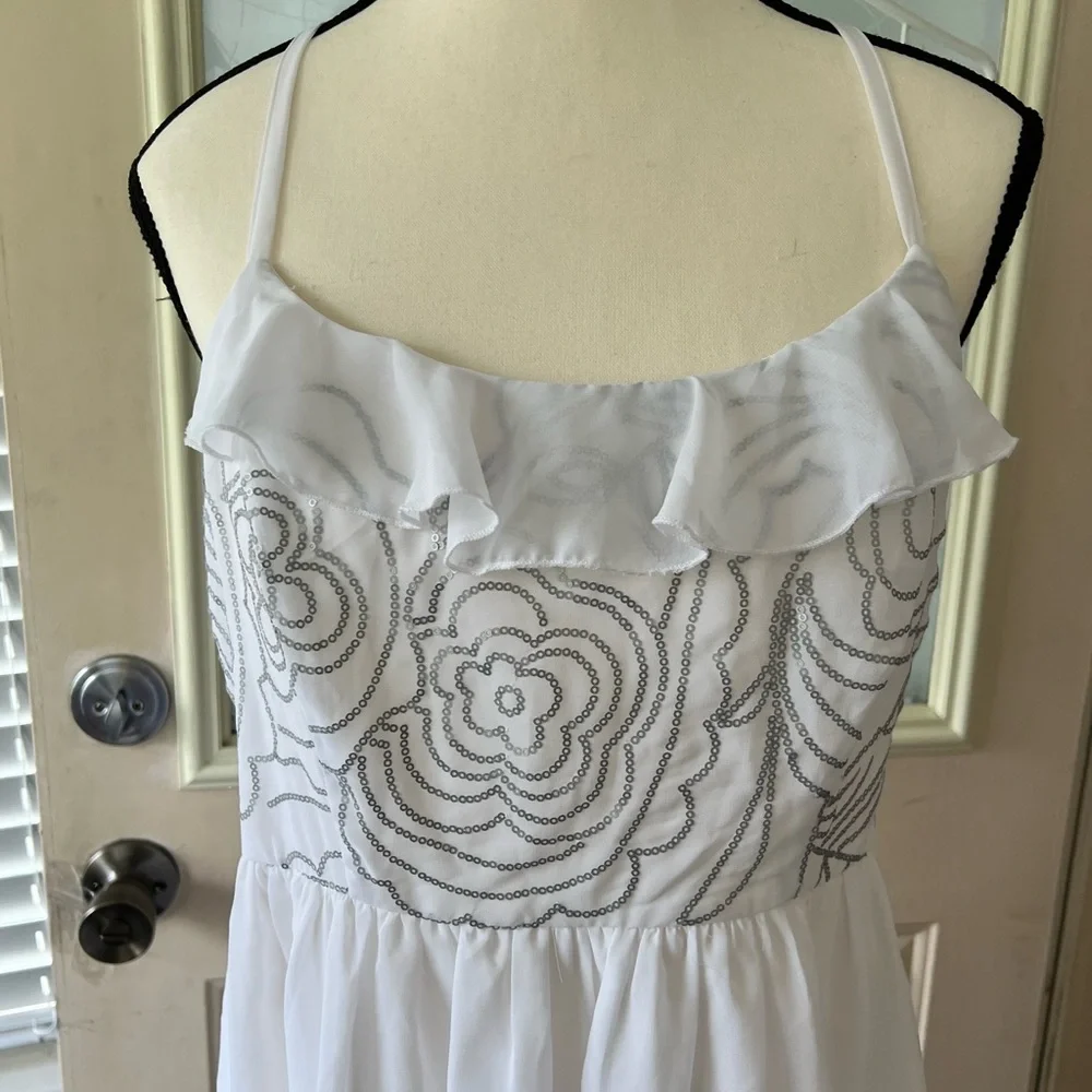 Johnny Martin size L white and silver floral Sequined dress. Racer back ruffled